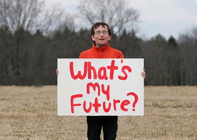 young man holding sign reading: "what's my future?"